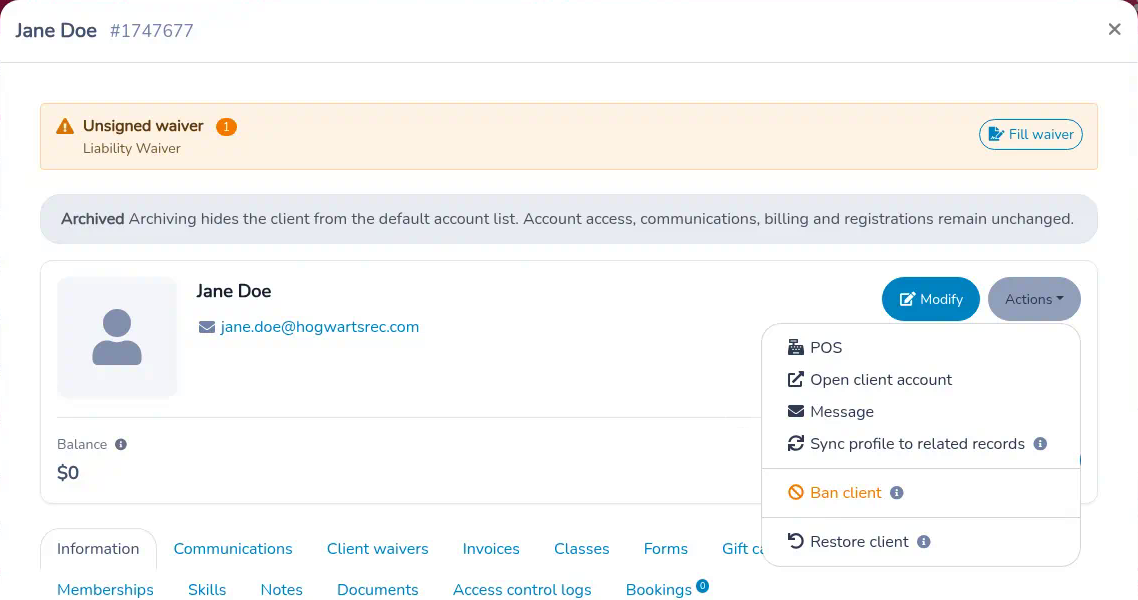 Archived client's account window with the grey Archived notice and the Actions menu showing Restore client