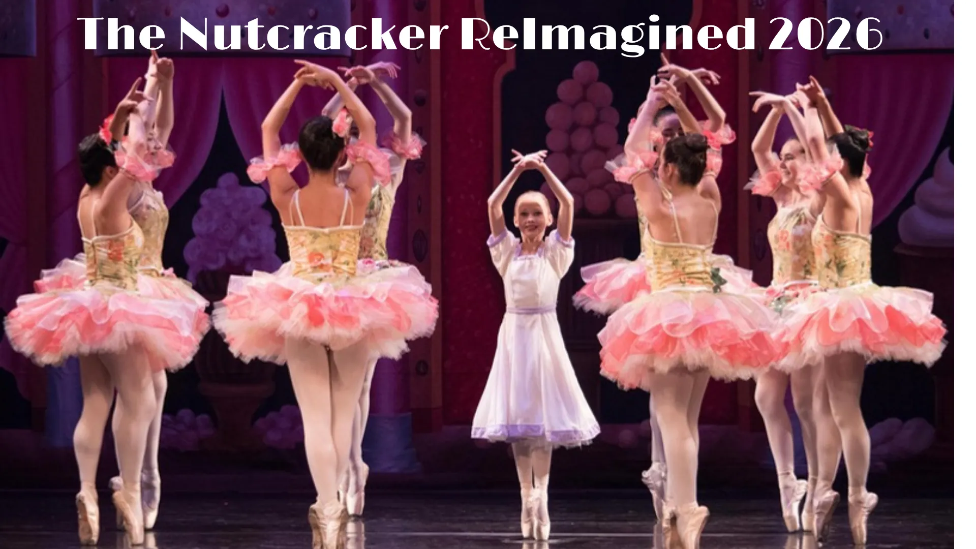 FVAD ballet students on stage in Nutcracker in pink flower tutus with Clara, and a Nutcracker doll.