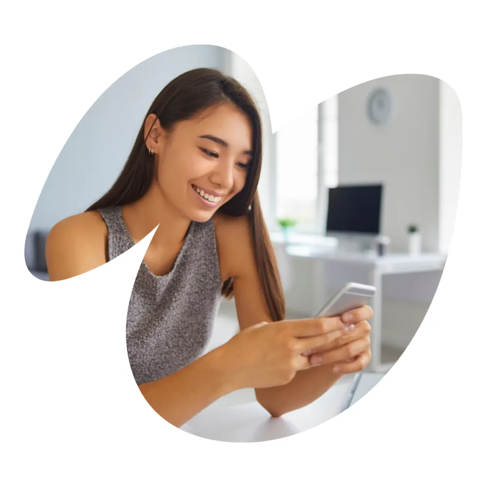 Parent booking an activity on her phone